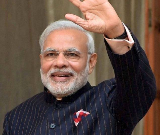 World News: Indian Prime Minister Modi's monogrammed suit enters ...